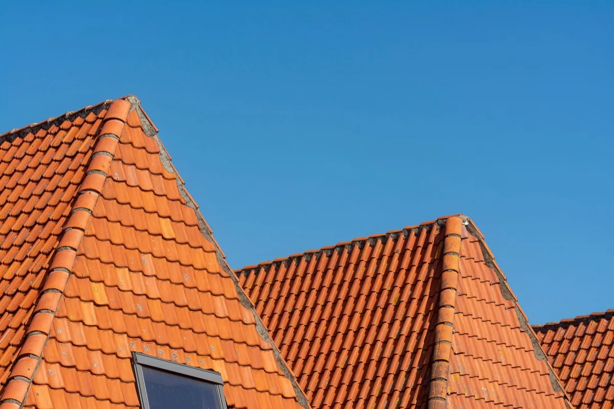 Clay barrel tile rooflines on homes in Nashville, TN