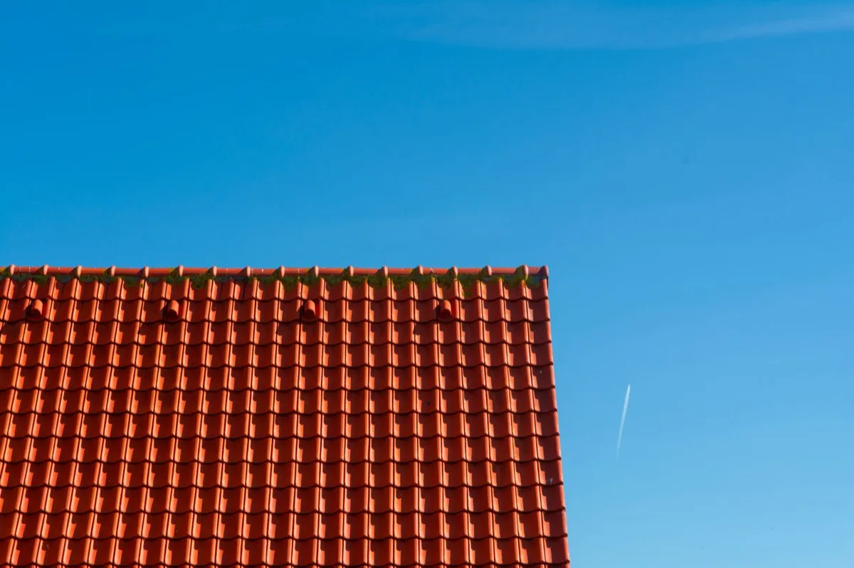 Tile roof gable in full sun, the kind of exposure that sets roof life in Nashville, TN